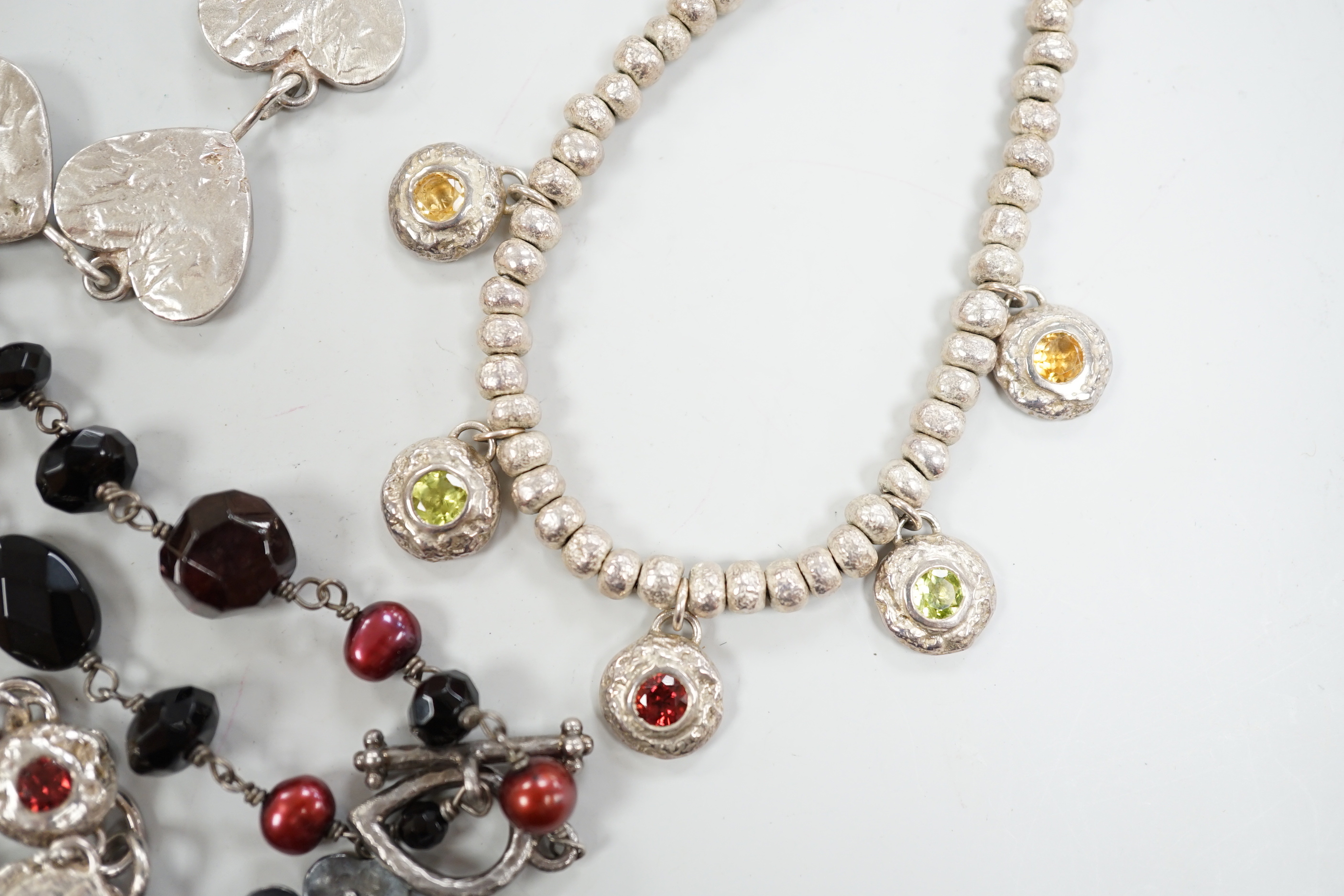 Two Pruden Smith silver necklaces and a similar bracelet, three other assorted silver necklaces and two silver bracelets, some with beads, largest 50cm.